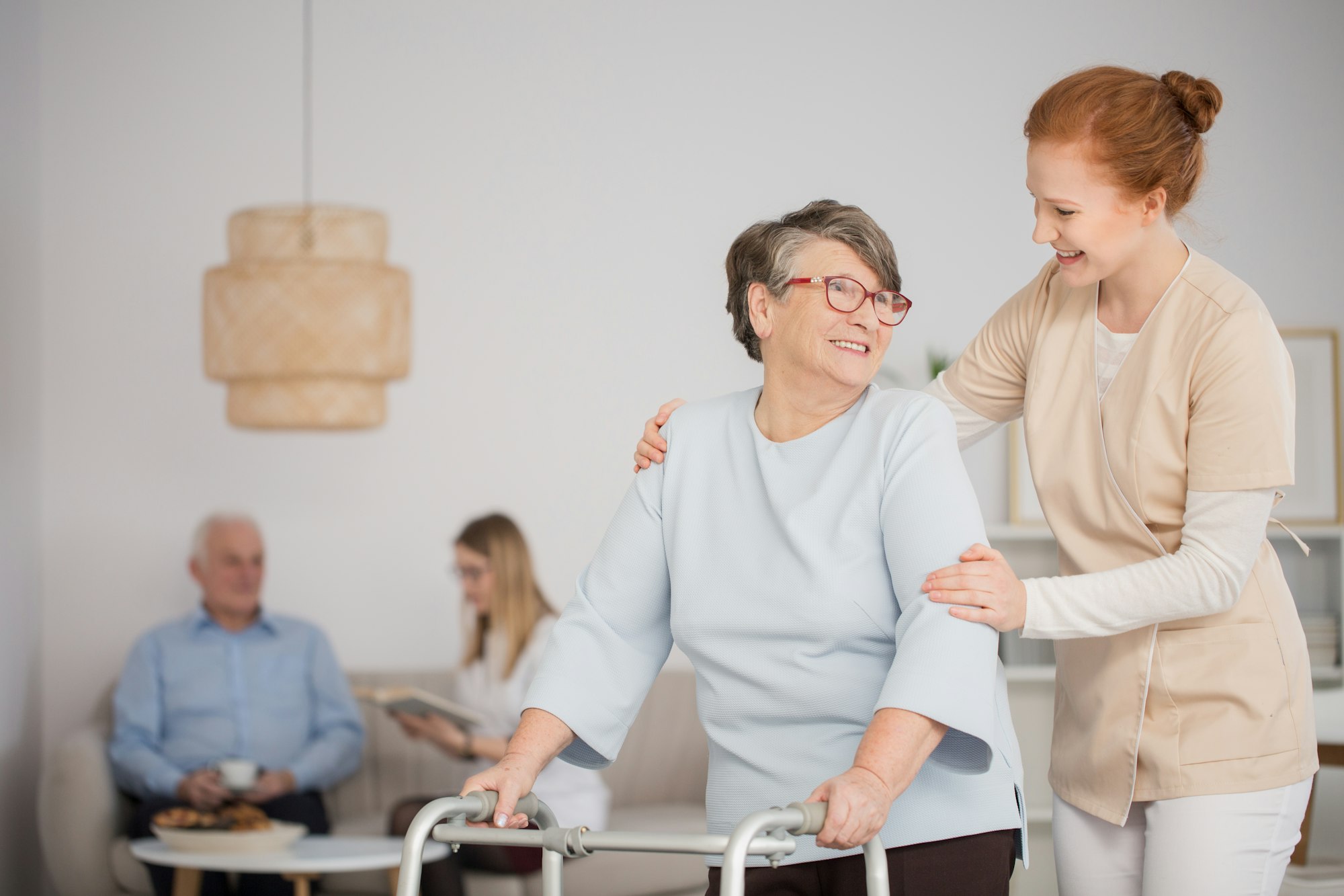 Nurse assisting senior